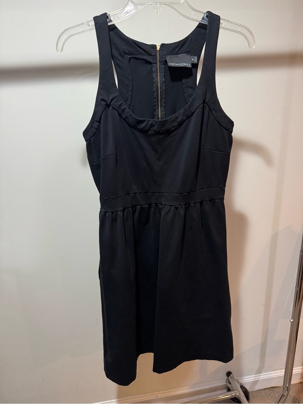 Very comfy/stretchy Cynthia Rowley black dress with zipper back and pockets
